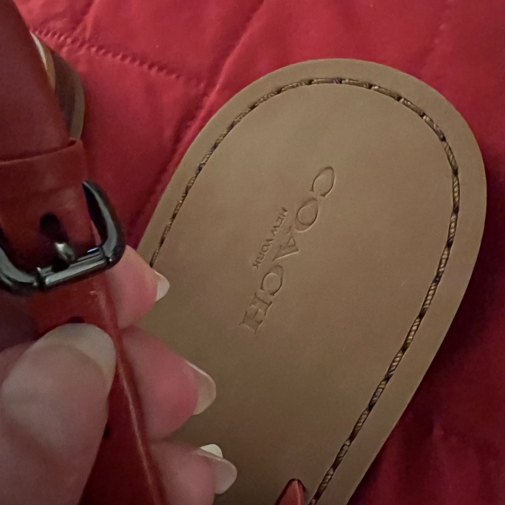 Coach Gracie Swagger Orange-Rust Orange Turn Lock Leather T Strap Sandals. - Picture 14 of 14